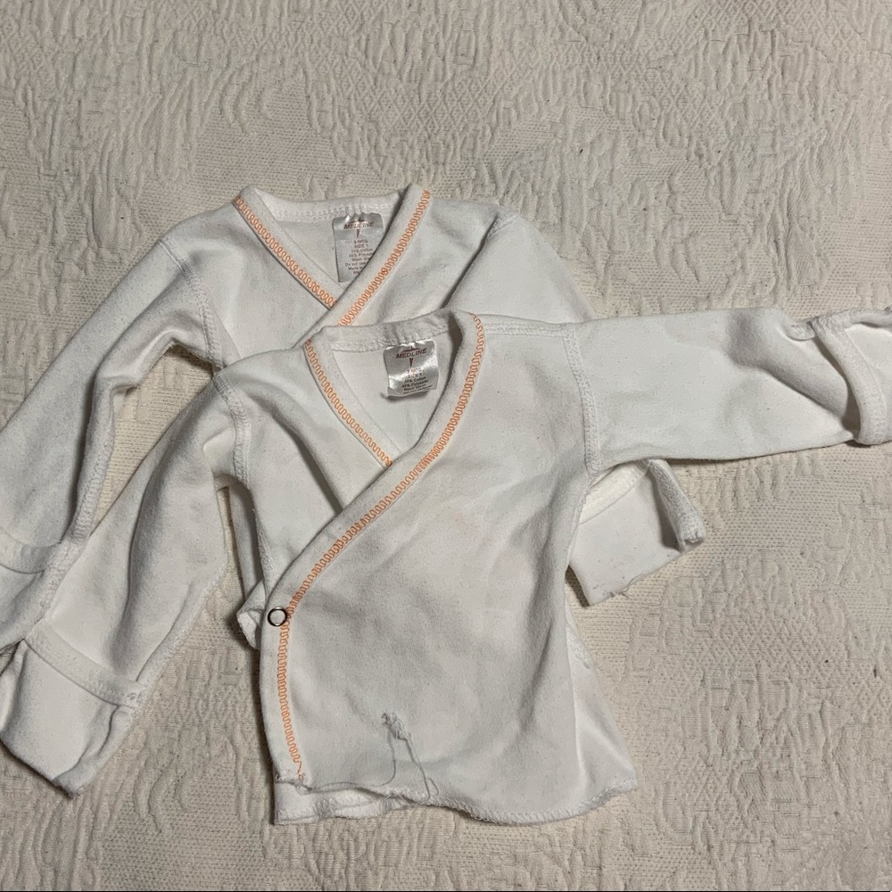 Set of two cuffed sleeve button tops